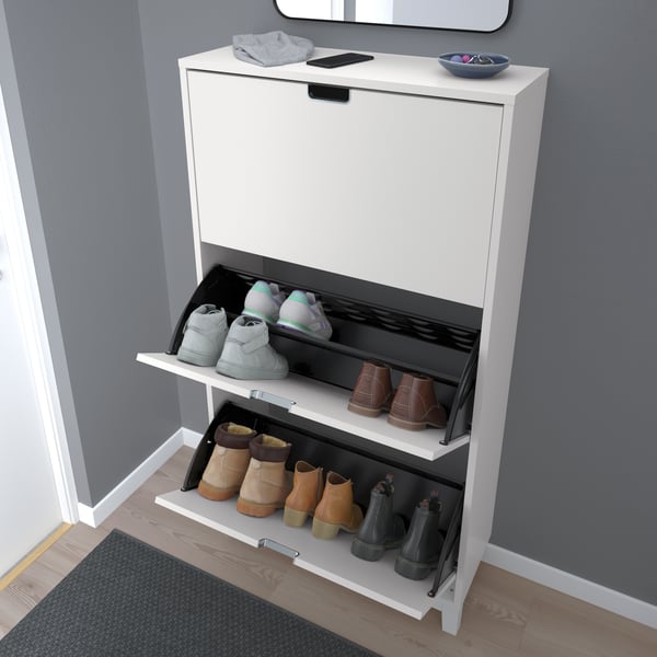 A white STÄLL shoe cabinet with 3 compartments