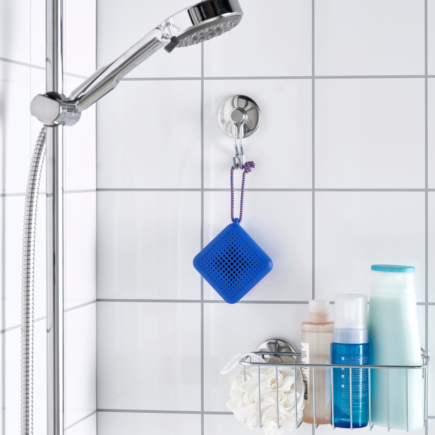 A waterproof/blue VAPPEBY portable bluetooth speaker