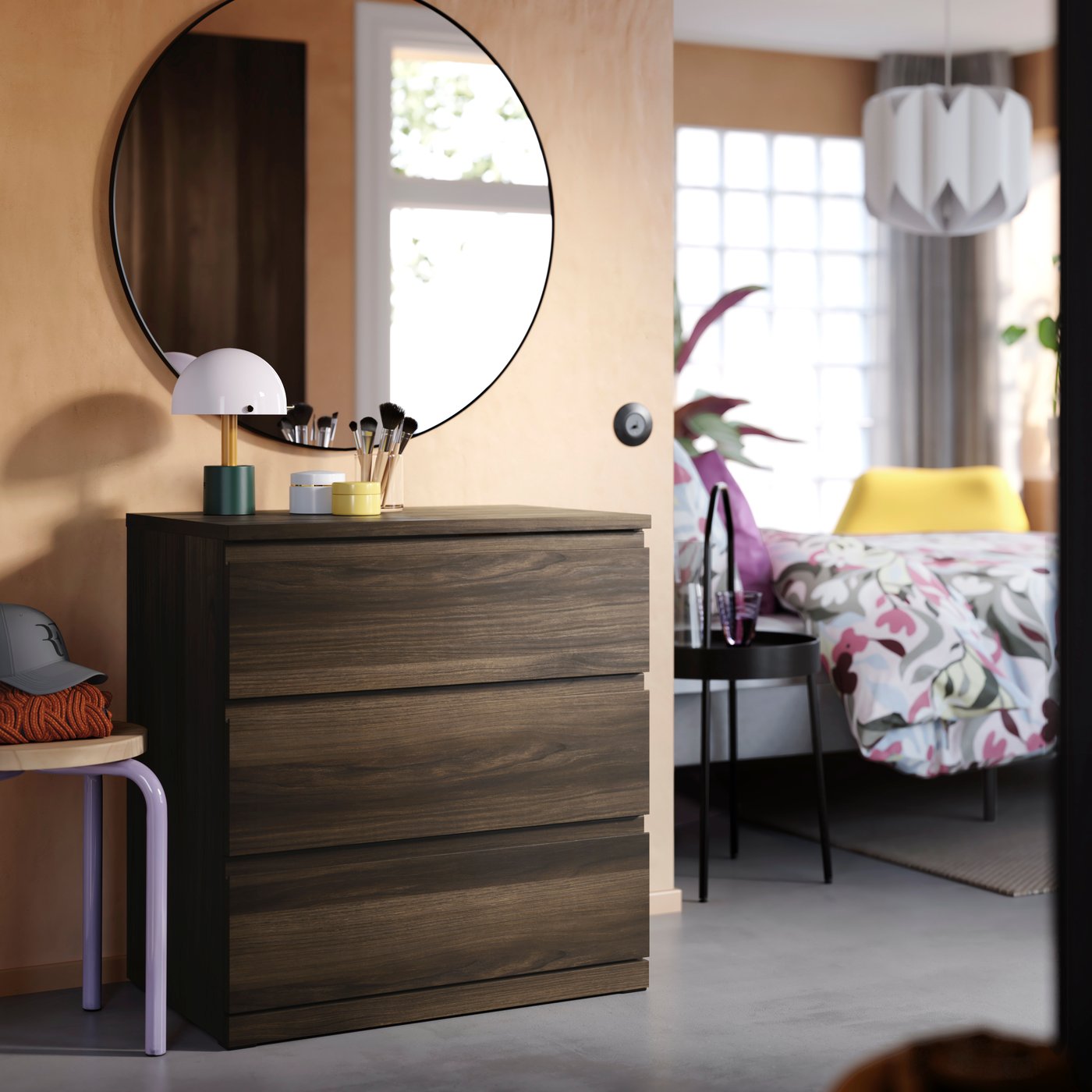 A dark brown/oak effect anchor/unlock-function STORKLINTA chest of 3 drawers