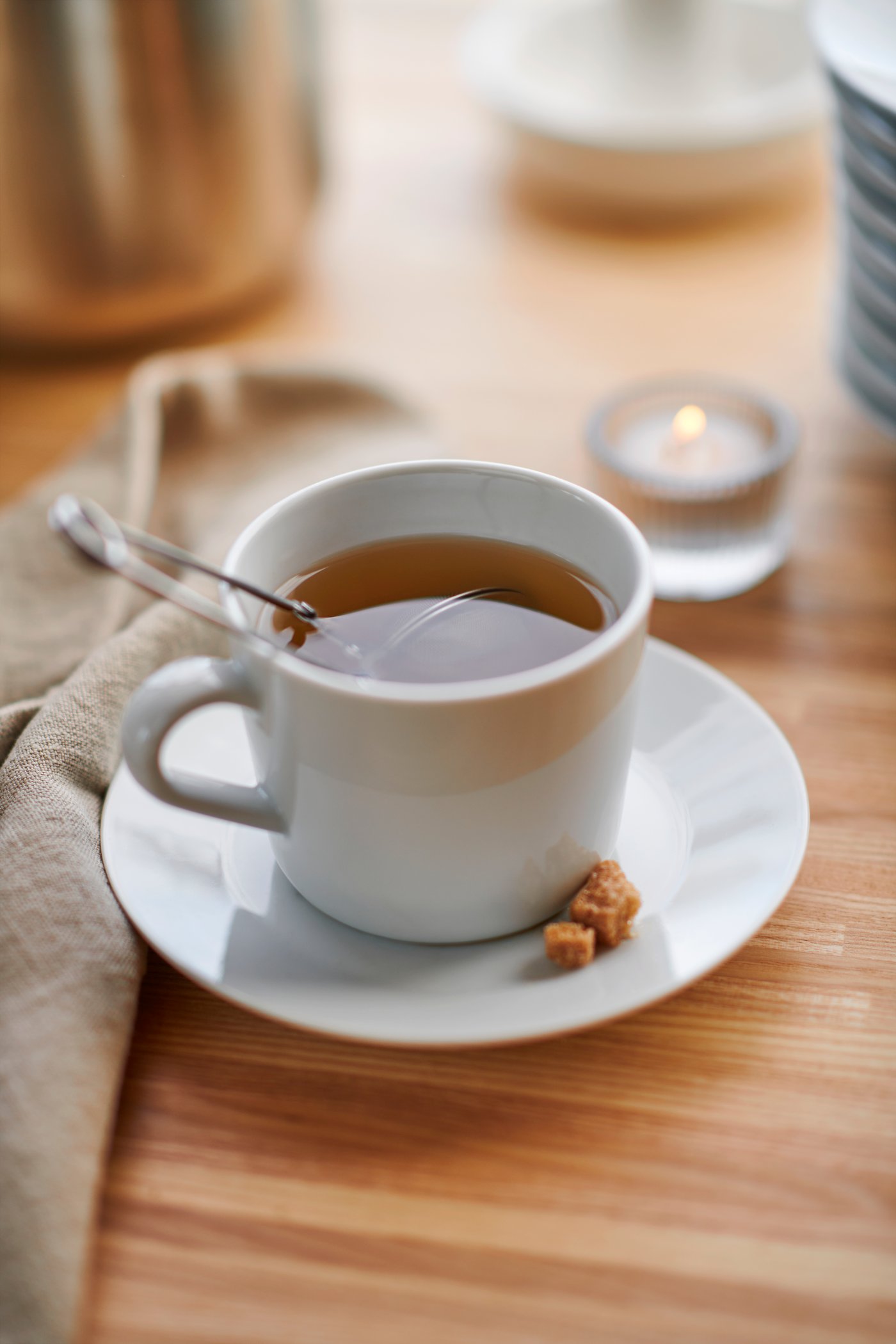 A stainless steel IDEALISK tea infuser