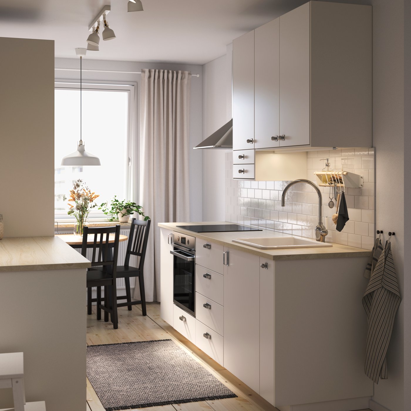 Une façade de tiroir VEDDINGE blanche dans la cuisine