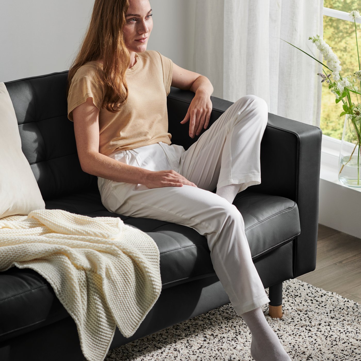A Grann/Bomstad black/metal MORABO 3-seat sofa in the living room