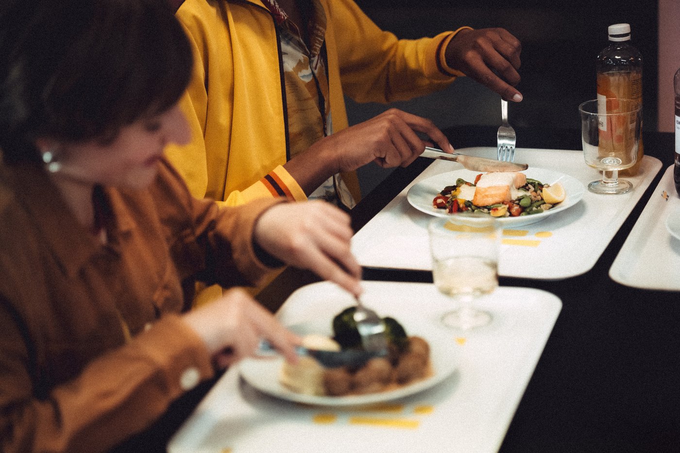People having meatballs at an IKEA restaurant