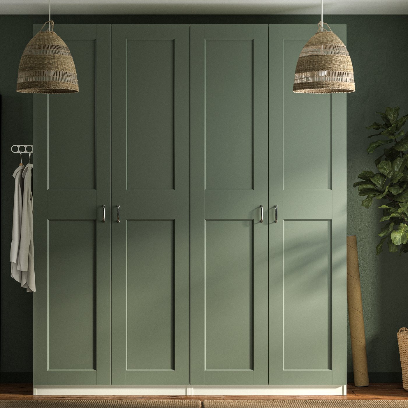PAX wardrobes with grey-green GRIMO doors in front of a matching green wall, and two sedge TORARED pendant lamps.