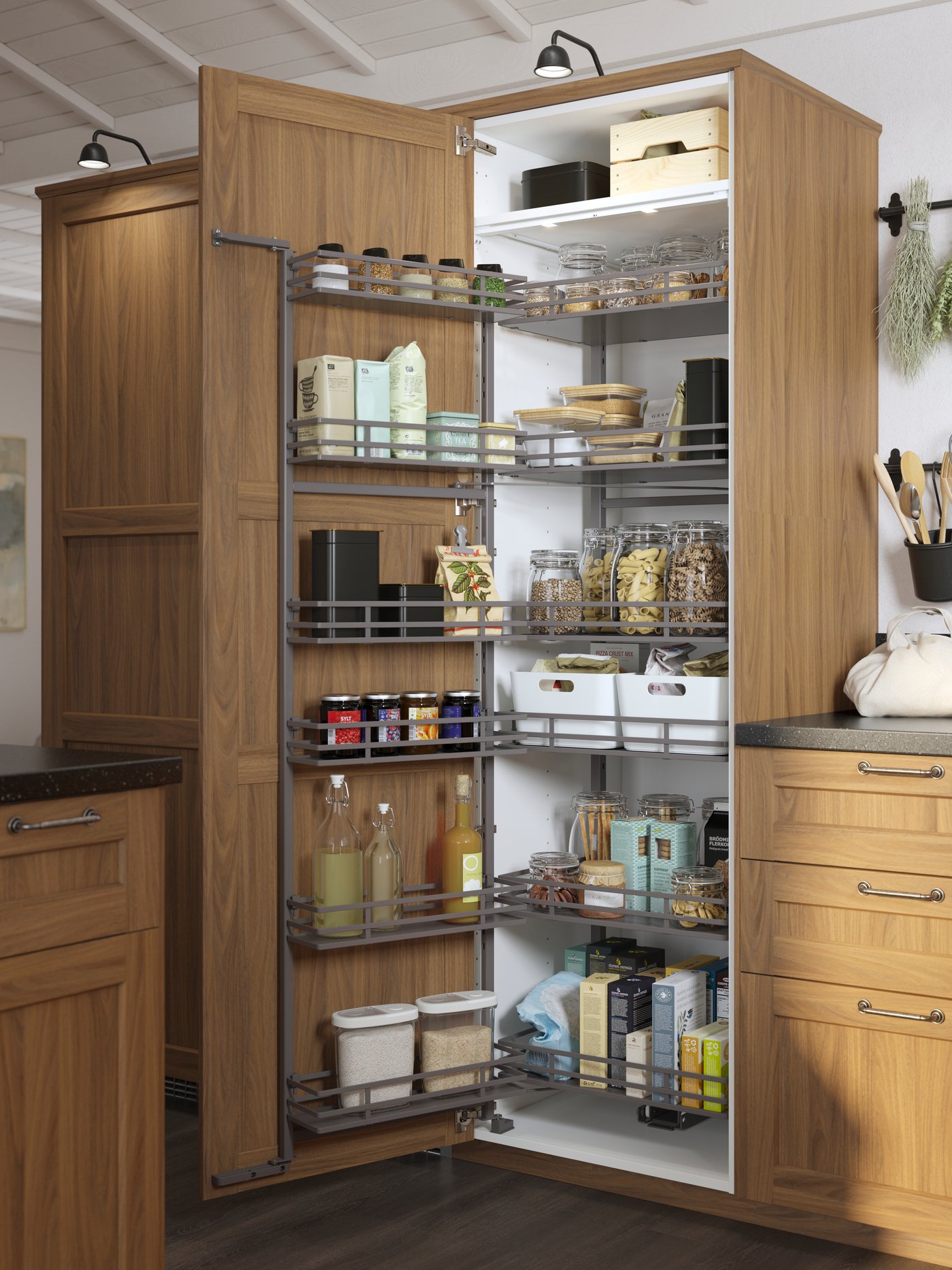 An UTRUSTA pull-out larder in a tall kitchen cabinet with a brown walnut-effect ENKÖPING door, with dry foods on the shelves.