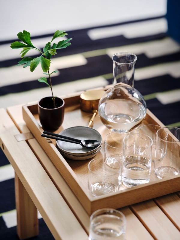 A glass STOCKHOLM 2025 carafe