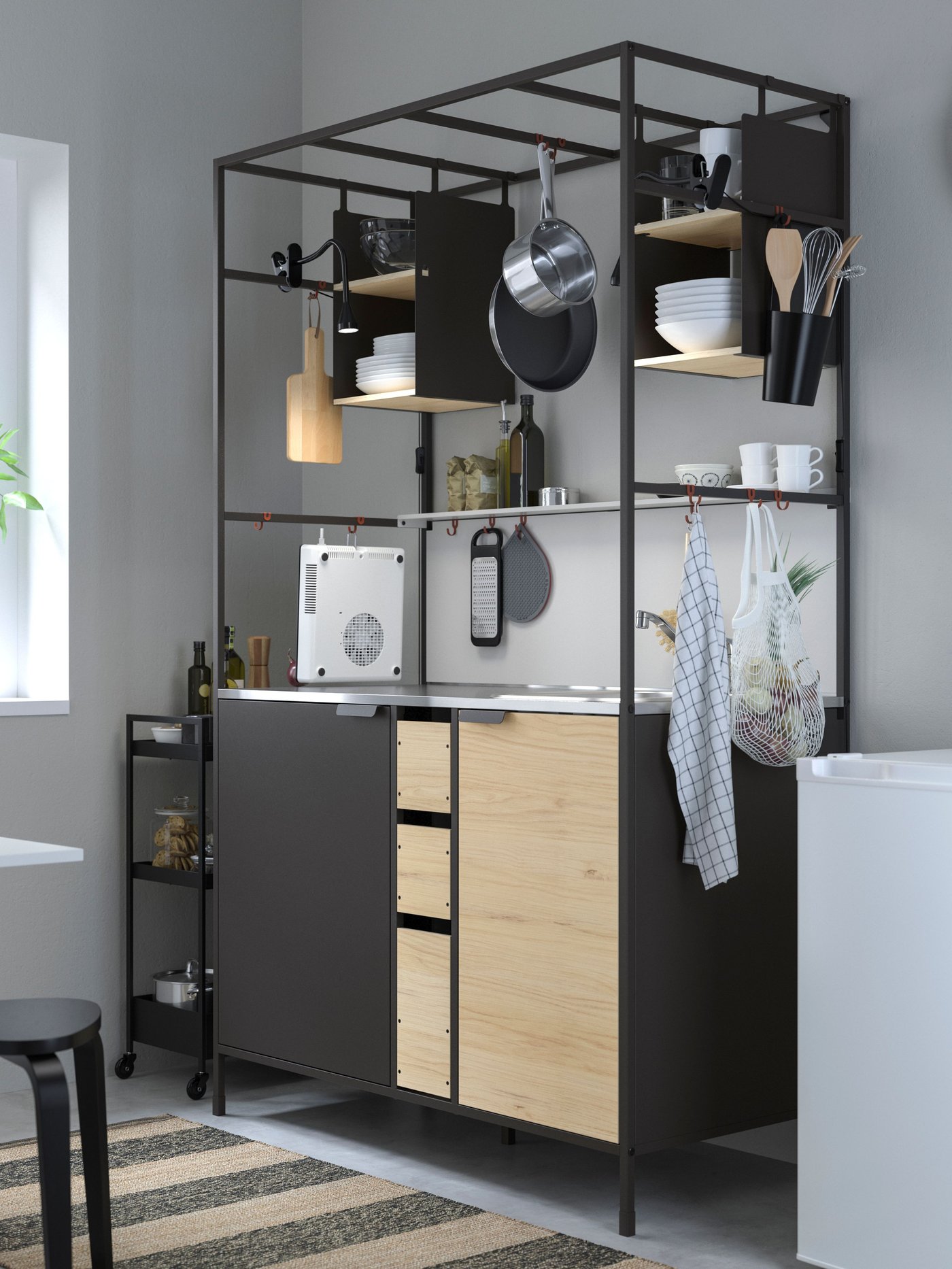 A black/ash ÄSPINGE kitchenette