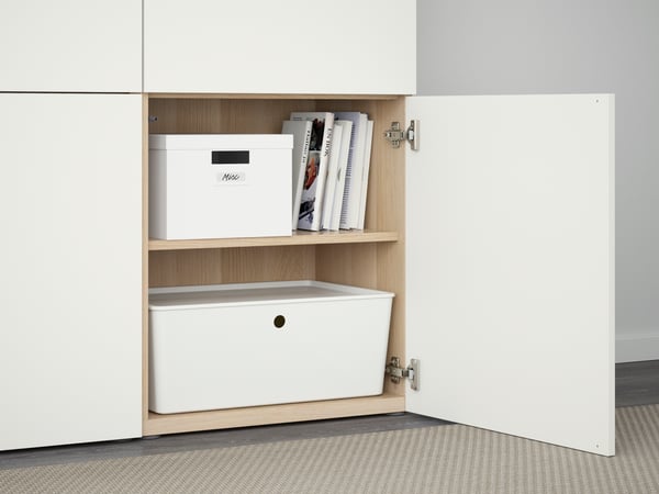 A white stained oak effect/Lappviken white BESTÅ storage combination with doors
