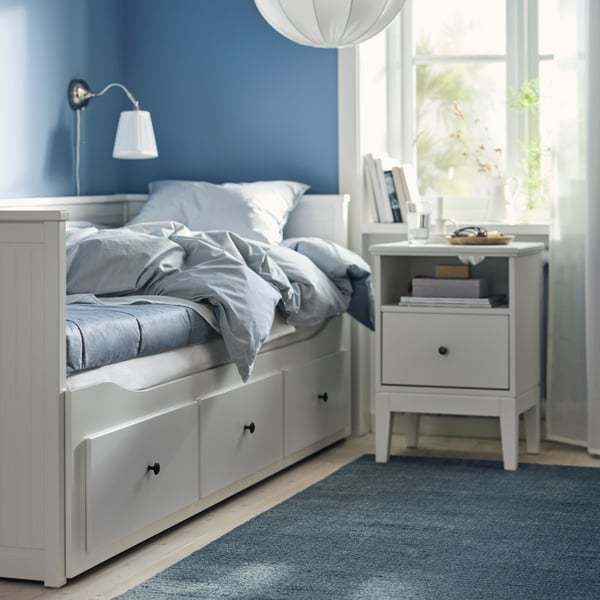 A firm/light blue ÅGOTNES foam mattress in the bedroom