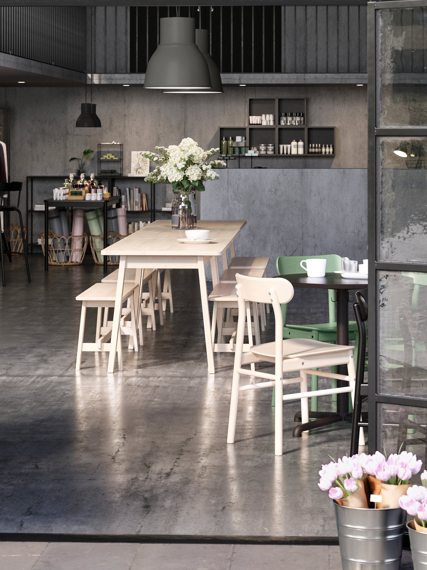 A dark grey HEKTAR pendant lamp in the dining room
