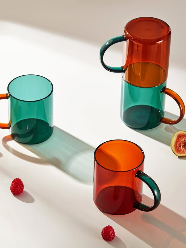 A mixed colours brown/green SKUGGSTUBB mug