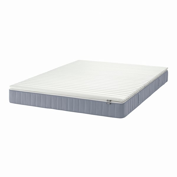 A firm light blue/Näsfjället white VESTERÖY mattress and mattress pad