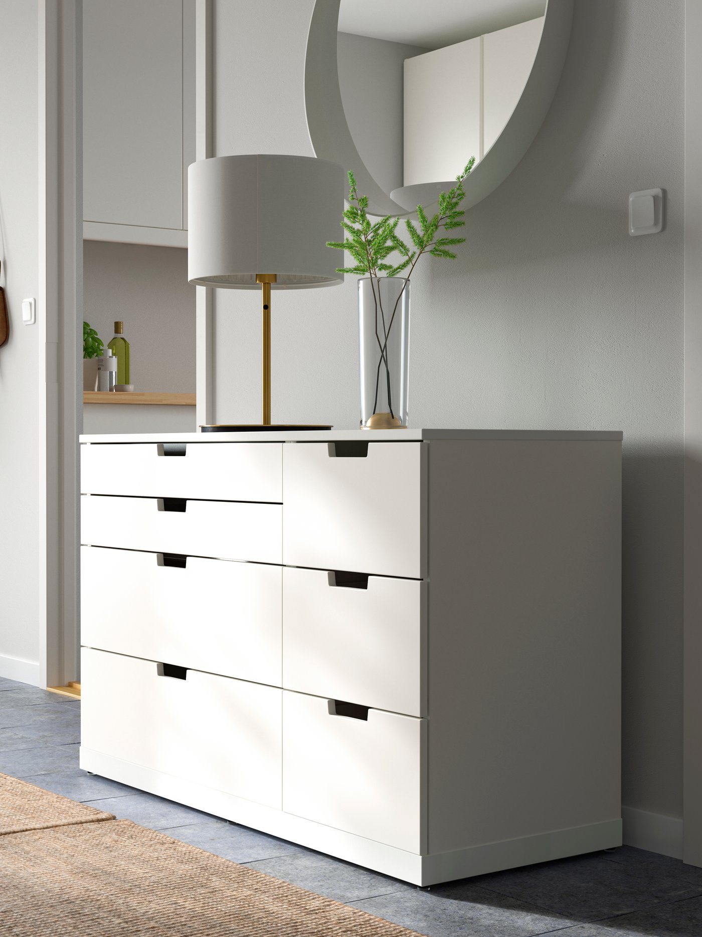 A white NORDLI chest of 7 drawers