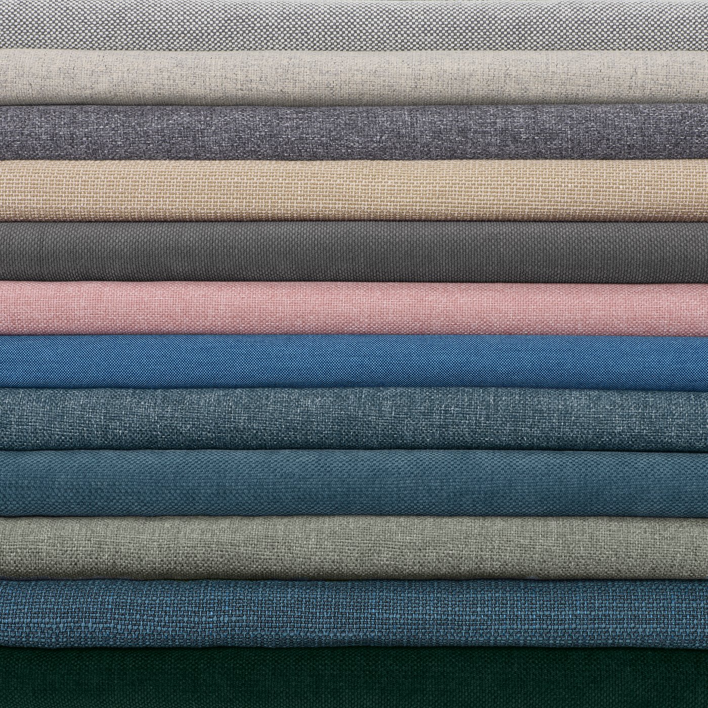 Stacks of IKEA+ custom-made sofa covers in various colours.