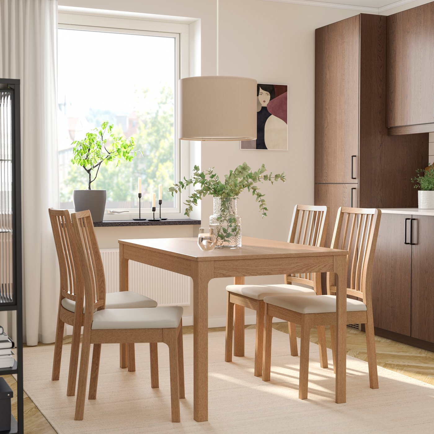 An oak/Hakebo beige oak effect EKEDALEN table and 4 chairs