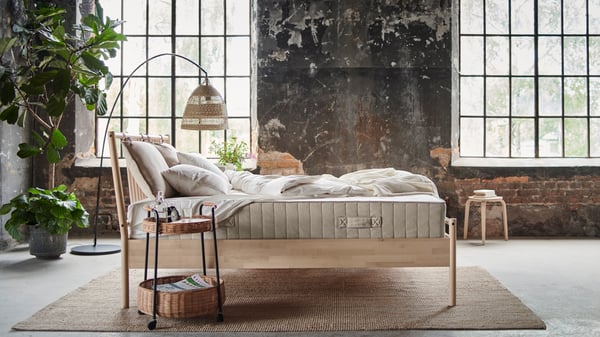 A firm/natural VATNESTRÖM pocket sprung mattress