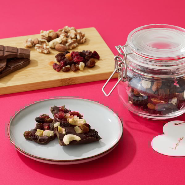 A clear glass KORKEN jar with lid