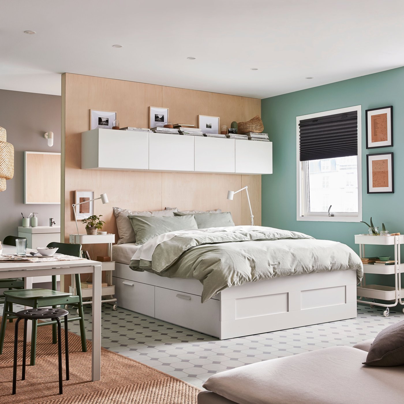 A white/Luröy BRIMNES bed frame with storage in the bedroom
