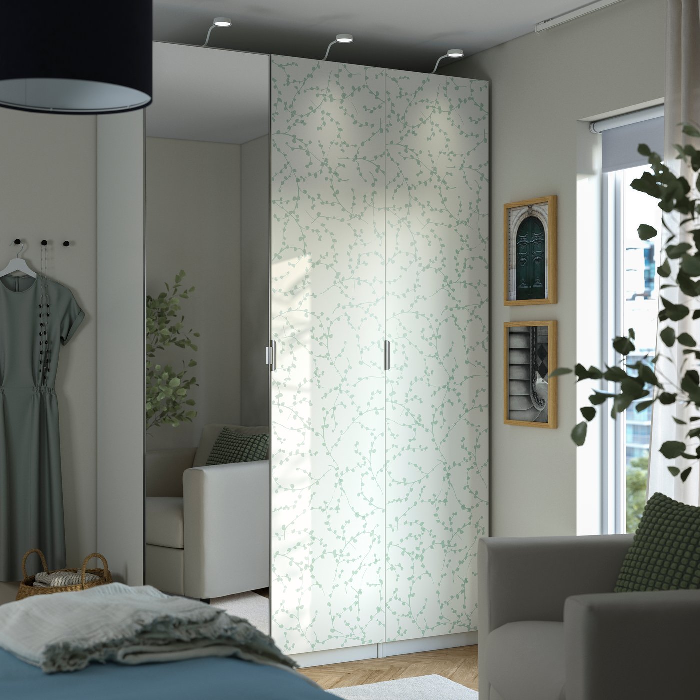 A white patterned/mirror glass PAX wardrobe combination