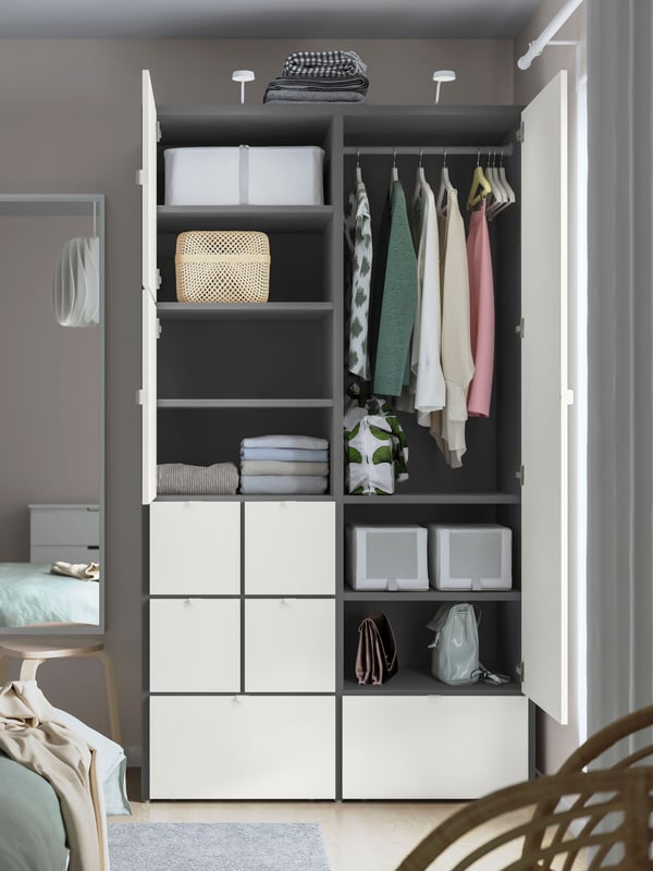 A grey/white VISTHUS wardrobe