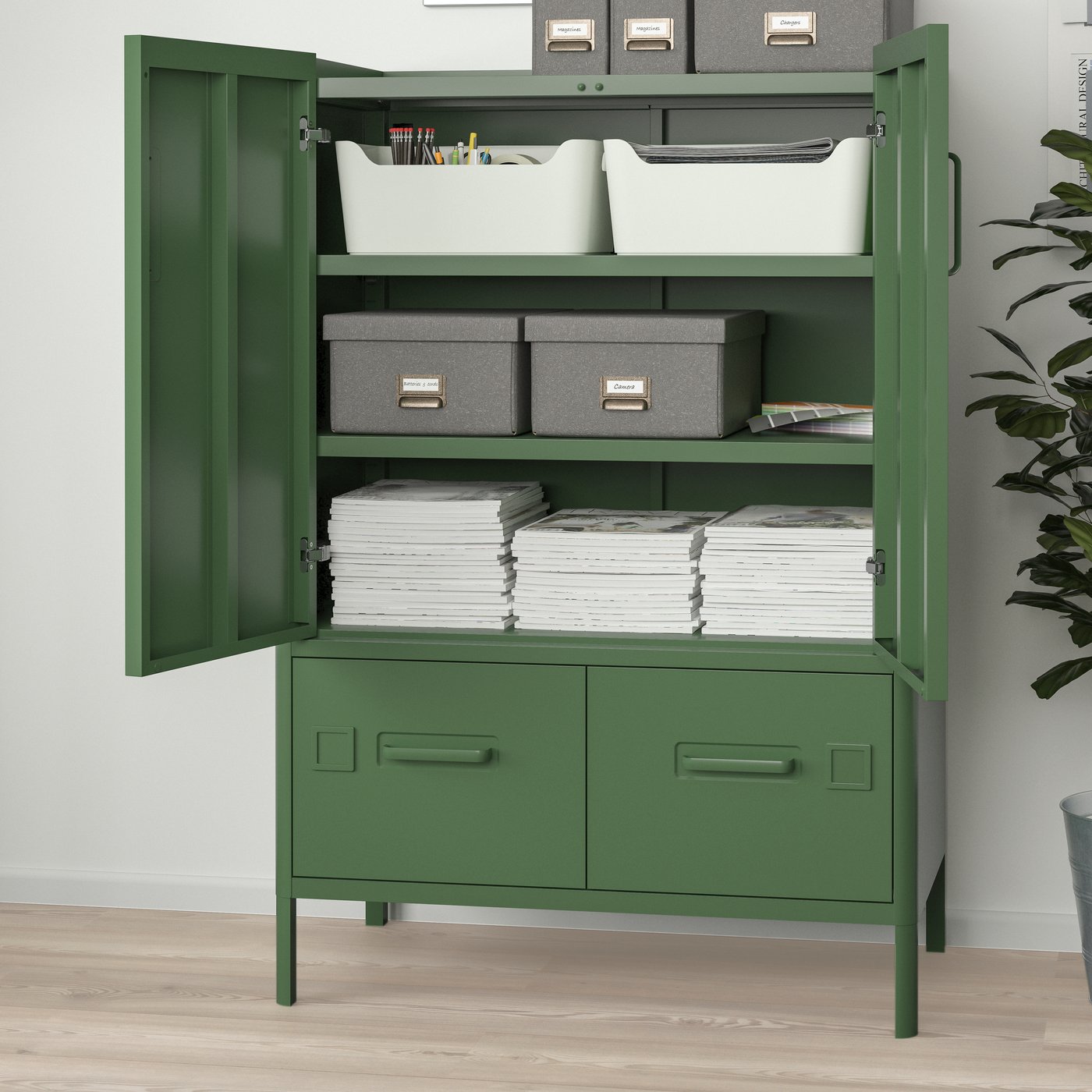 A dark green IDÅSEN cabinet with doors and drawers