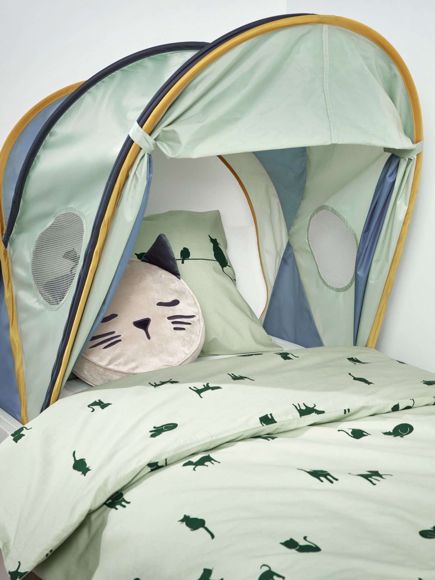 A blue/green ELDFLUGA bed tent