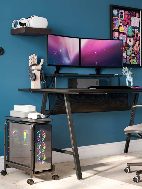 A black UTESPELARE gaming desk