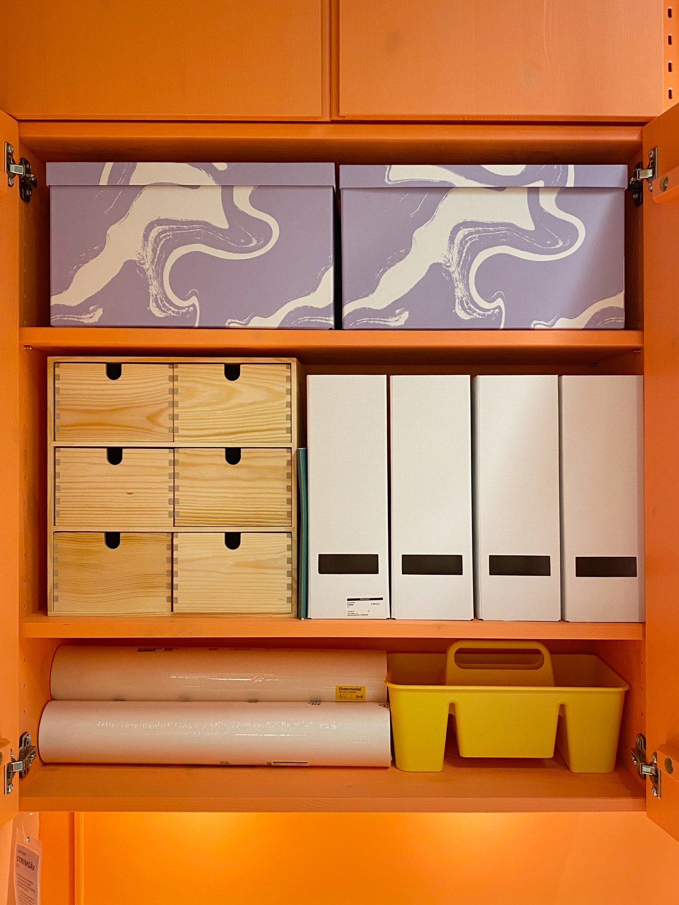 A patterned/lilac white TJENA storage box with lid