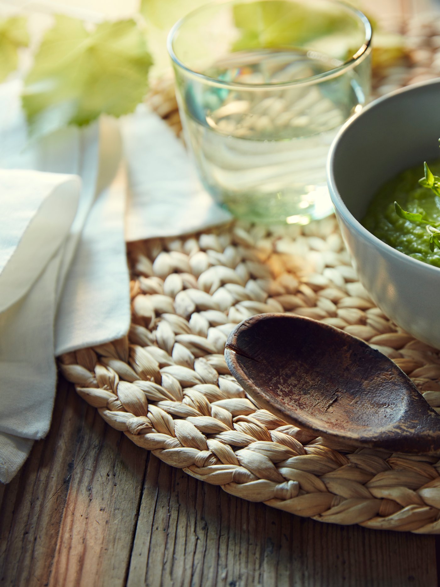 A water hyacinth SOARÉ place mat in the dining room