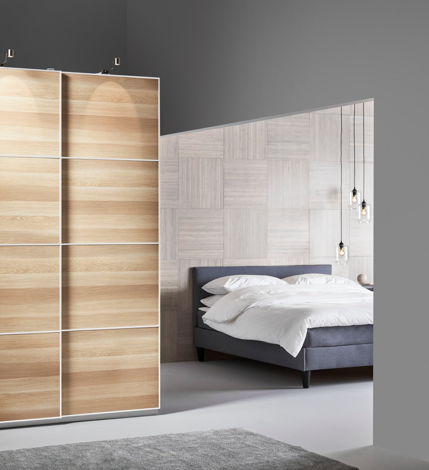 A white/grey KUNGSBLOMMA duvet cover and 2 pillowcases in the bedroom