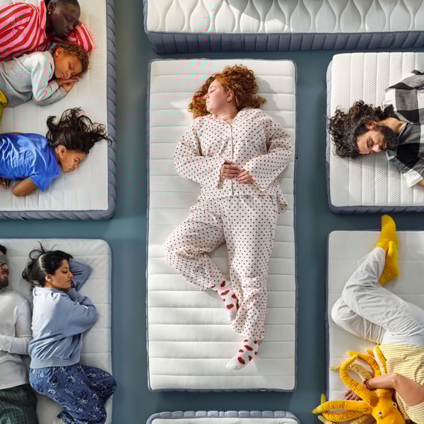 A firm/light blue VALEVÅG pocket sprung mattress in the NA