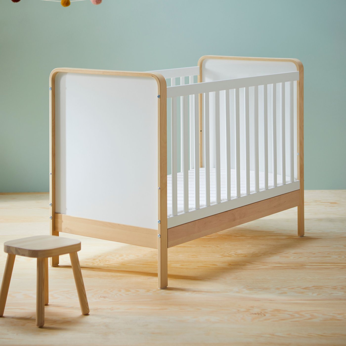 A birch/white ÄLSKVÄRD cot