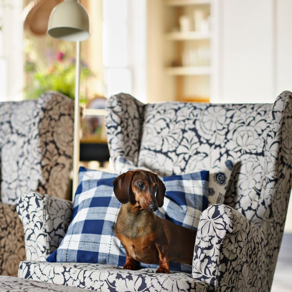 A light beige RÖDFLIK floor/reading lamp