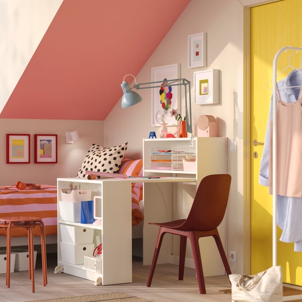 A white BILLY bookcase with foldable table