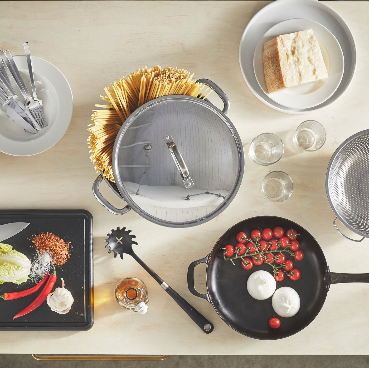 A stainless steel IKEA 365+ pot with lid