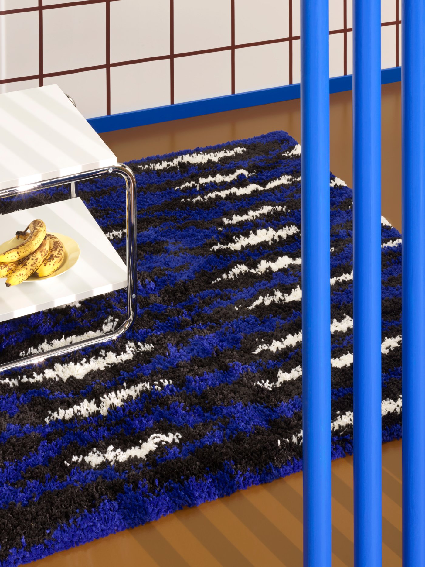 A blue white/black BULLERREMSA rug, high pile