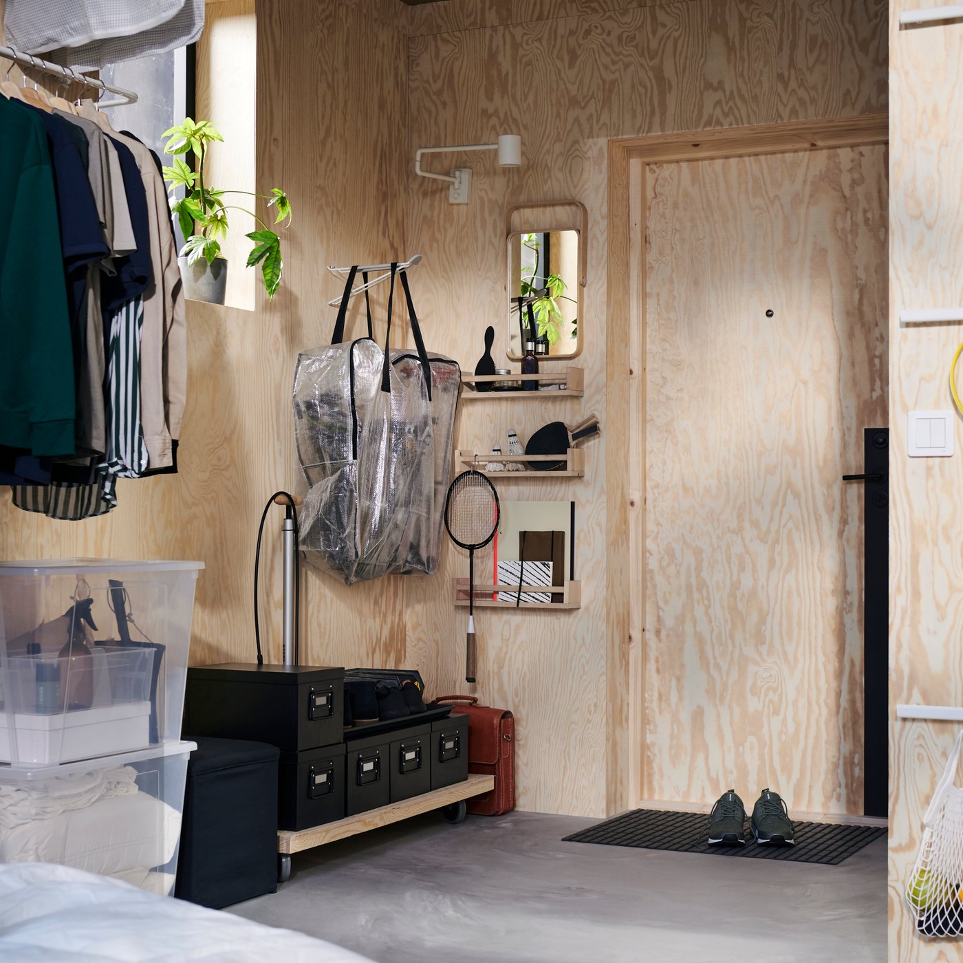 A black MANICK box with lid in the hallway