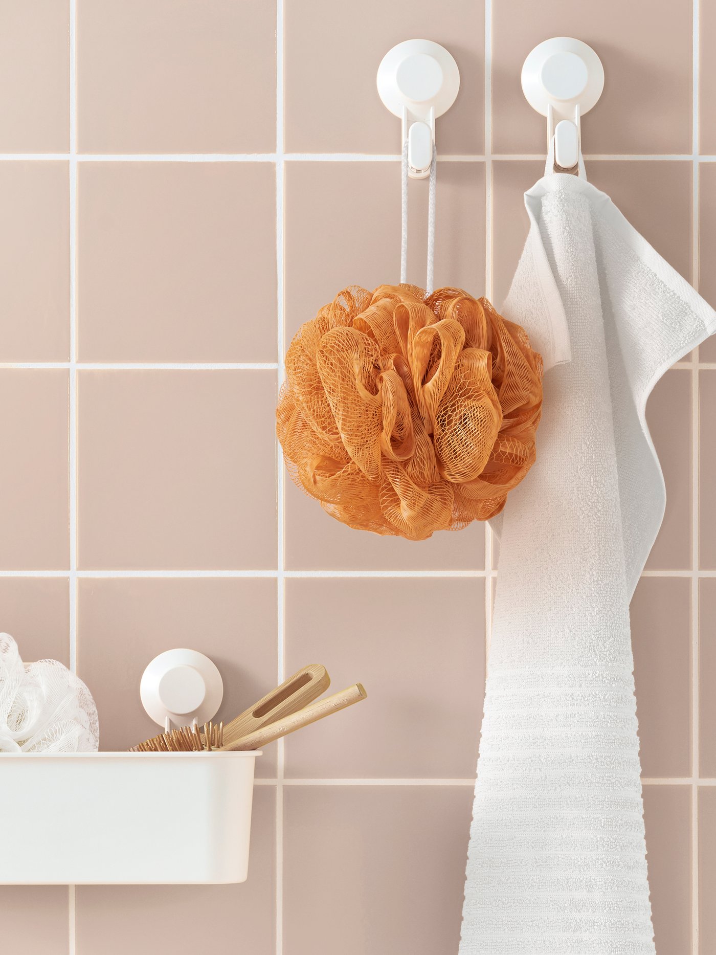 An orange/green/white ÅBYÅN body puff