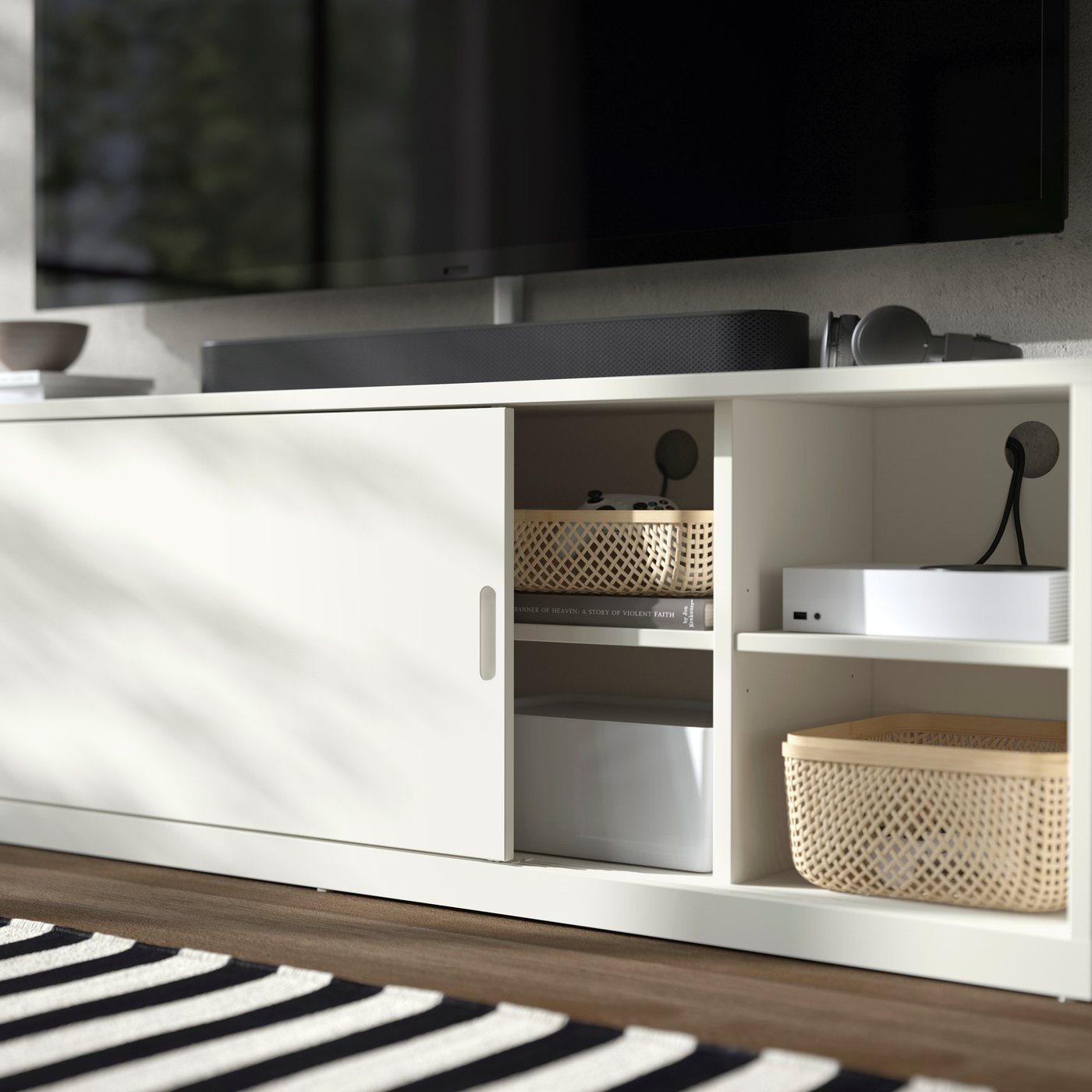 An off-white TONSTAD TV bench in the living room