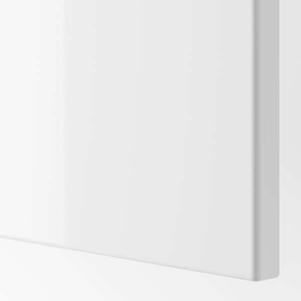 A high-gloss white FARDAL door