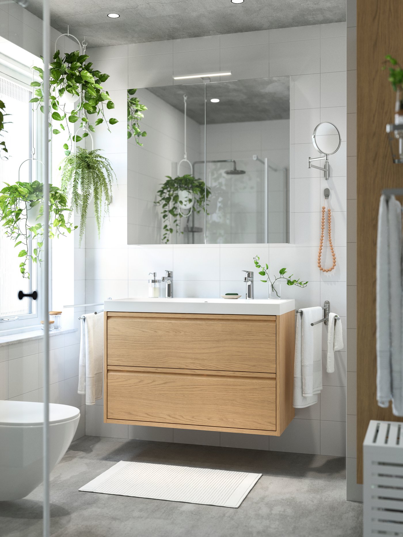 A white MUSKAN storage stool in the bathroom