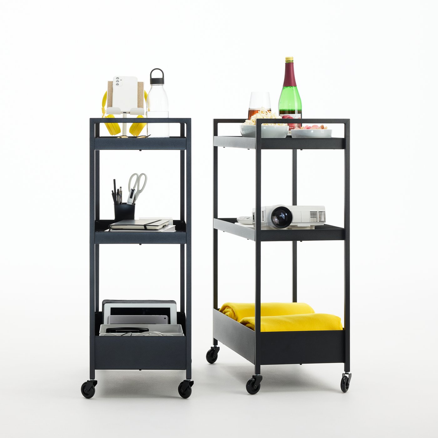 Two NISSAFORS trolleys, one with computer and work things, the other with snacks and a video projector.