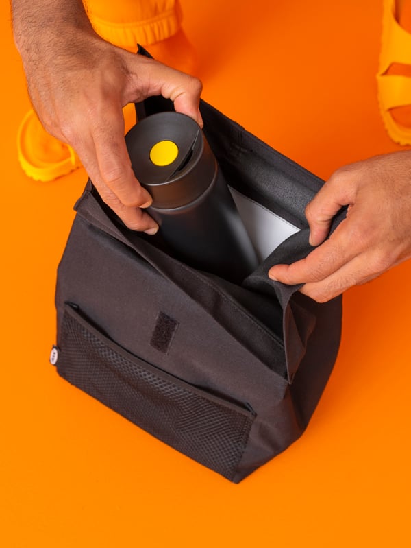 A black FRAMTUNG lunch bag