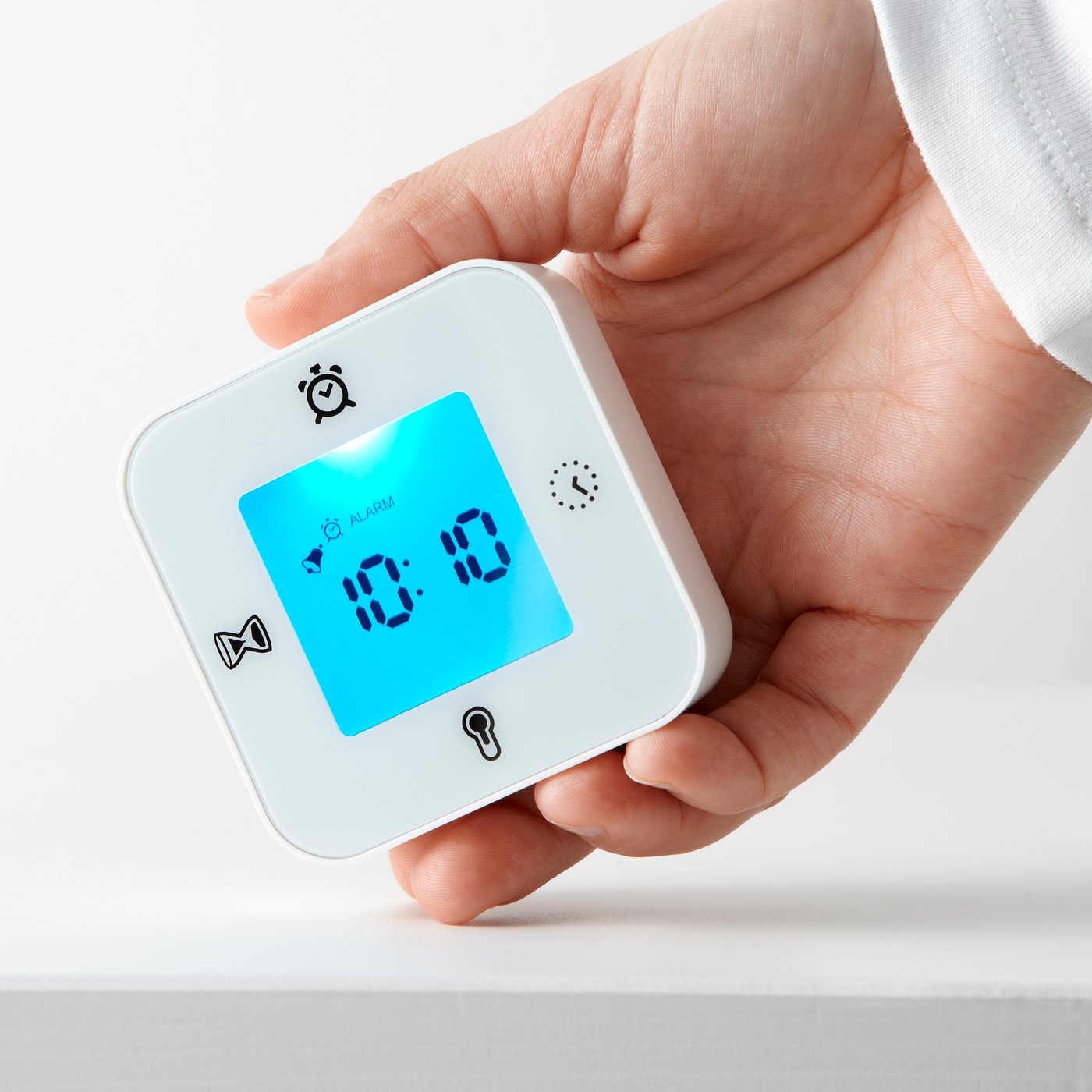 A white KLOCKIS clock/thermometer/alarm/timer