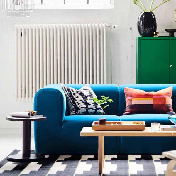 An Alhamn dark turquoise STOCKHOLM 2025 2-seat sofa in the living room