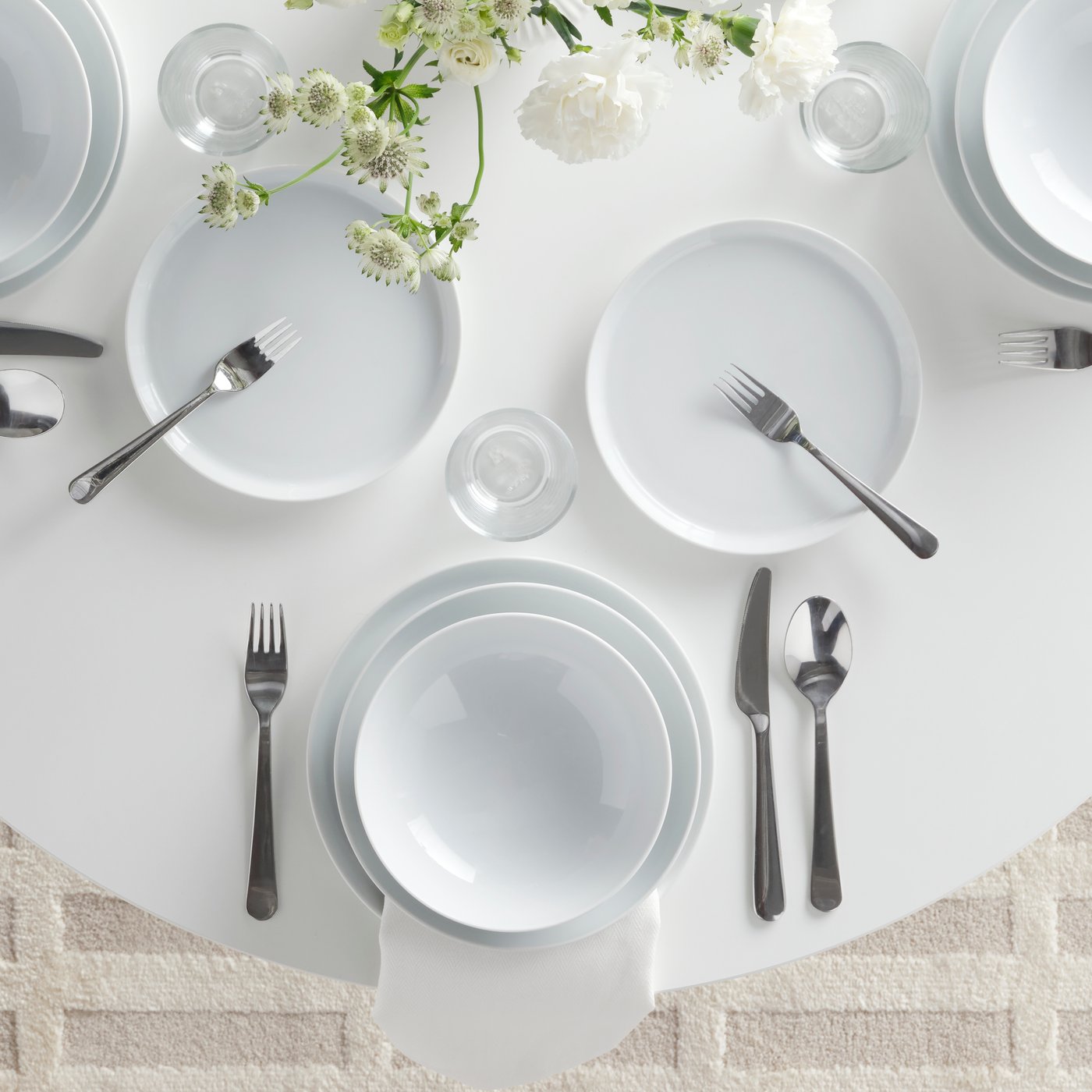 A stainless steel DRAGON 24-piece cutlery set