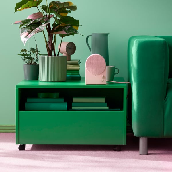 A green GARNANÄS coffee table in the living room
