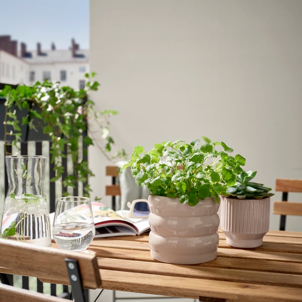 An in/outdoor/beige HASSELBUKETT plant pot