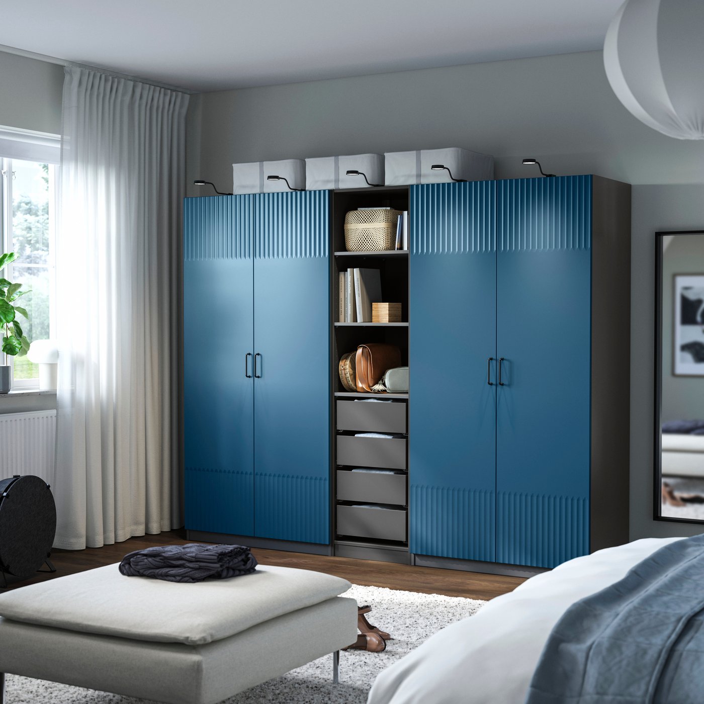 A dark grey/blue PAX wardrobe combination