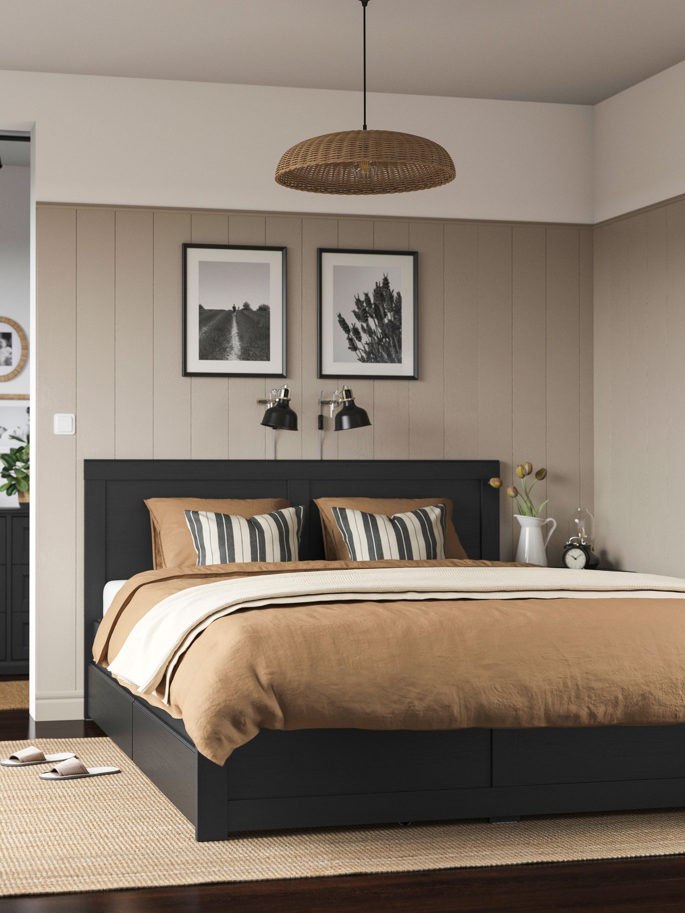 A black oak effect/Lönset FÅGELFJÄLLET bed frame with 2 storage boxes in the bedroom